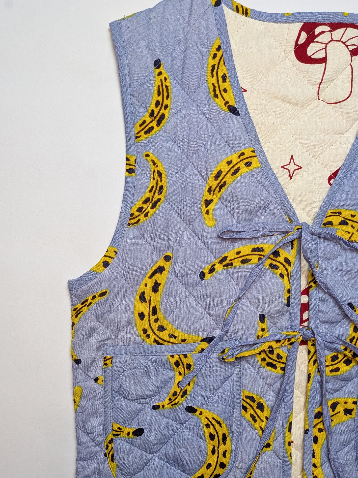 Cool Banana / Magic Mushroom reversible quilted waistcoat