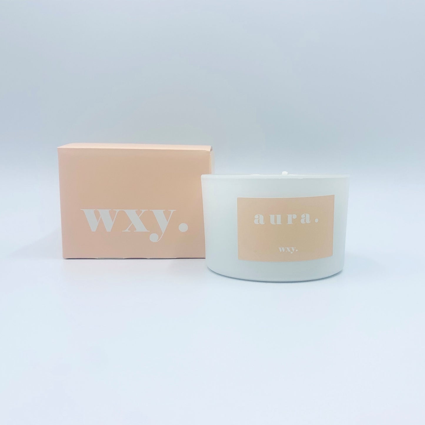 wxy. AURA White Woods + Amber Down 3oz Candle